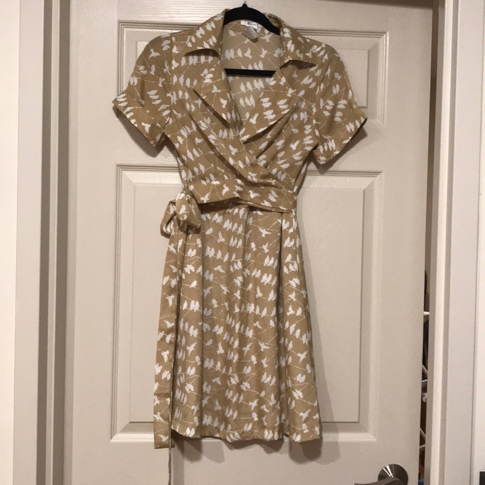 Yellow-gold wrap dress with bird print